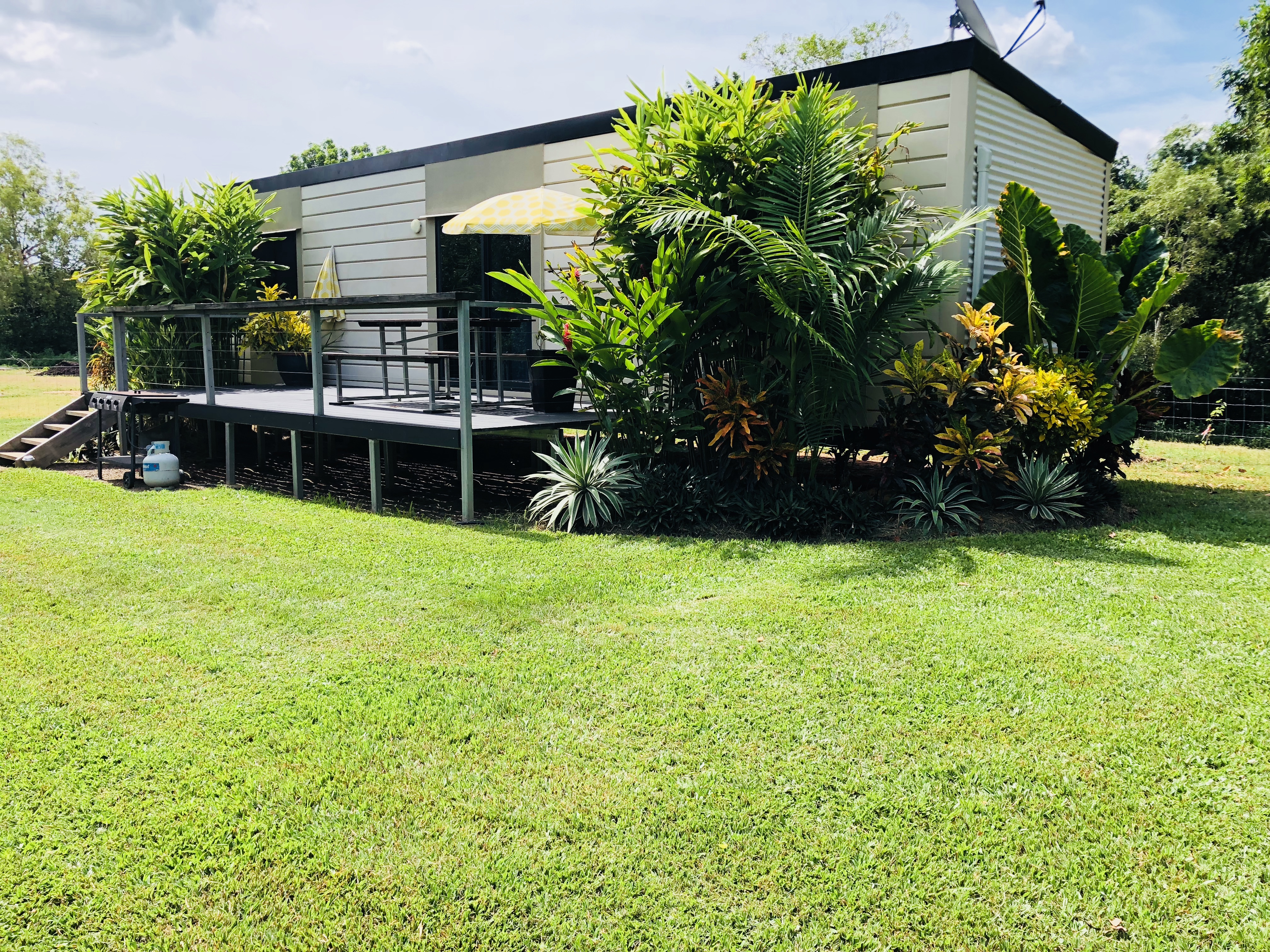 Monsoon Cabin. Modern cabin overlooking a bird filled Billabong at Mt Bundy Station