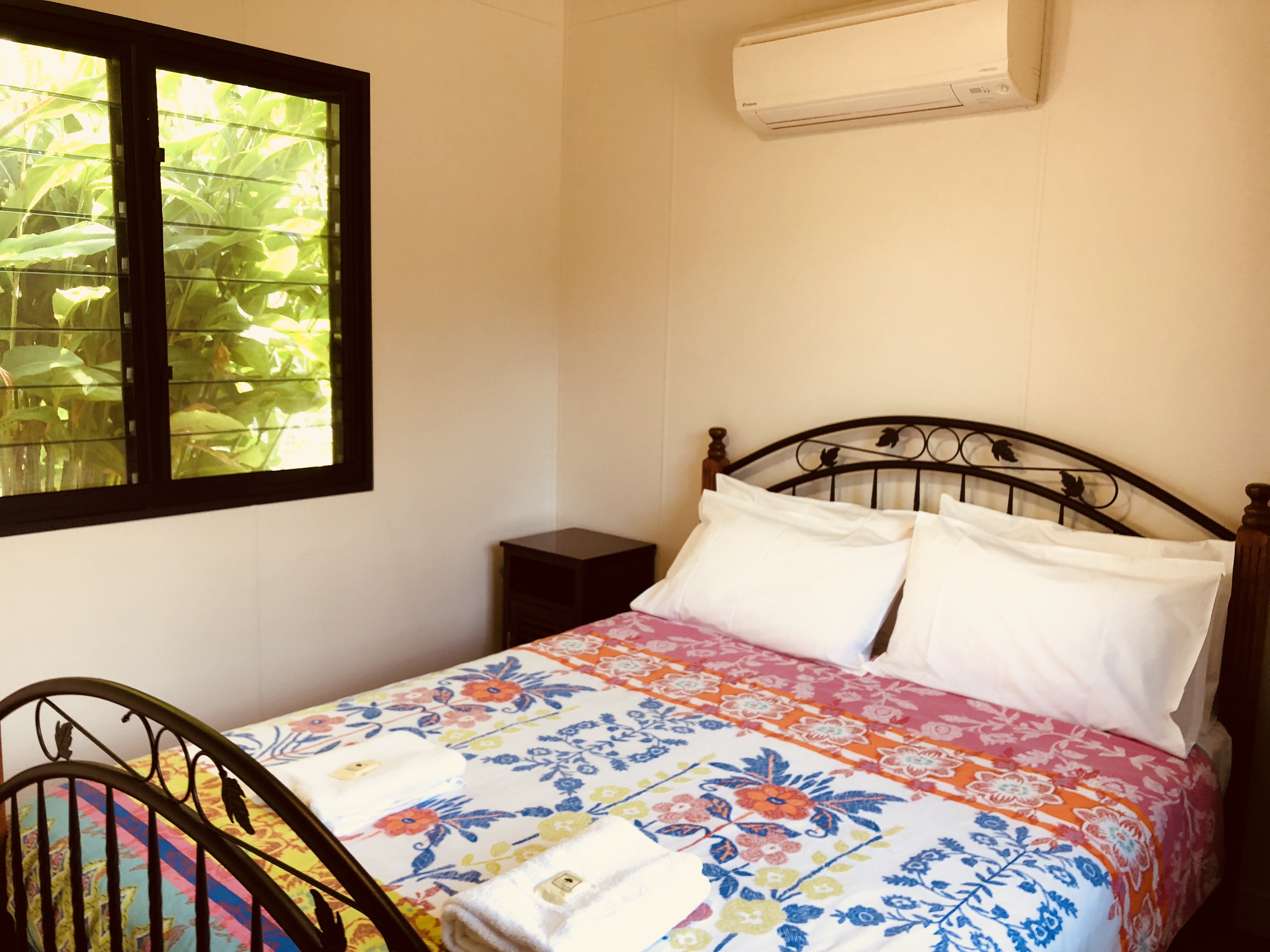 Monsoon Cabin bedroom. Modern cabin, self contained to sleep 4 at Mt Bundy Station